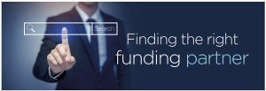 Finding the right funding partner - man pointing at search bar.